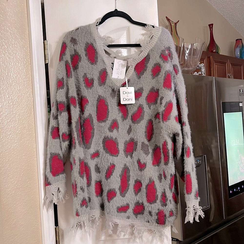 Brand new boutique sweater